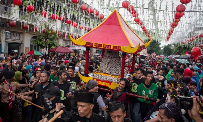 Người dân châu Á rộn ràng đón Tết Kỷ Hợi