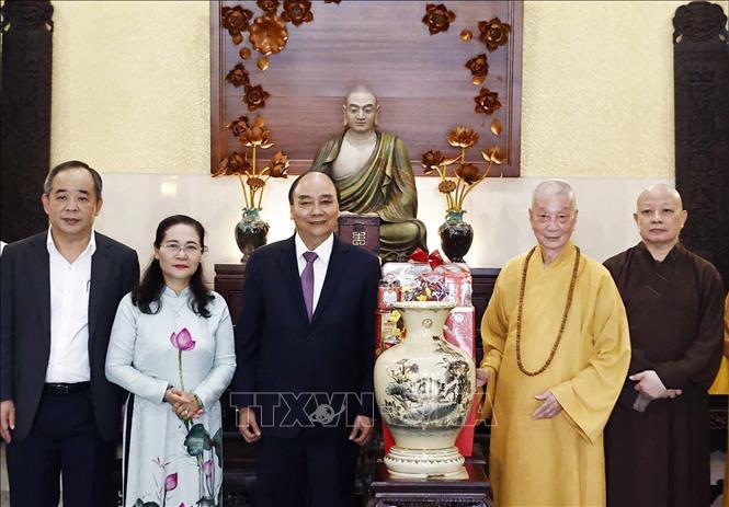 Chủ tịch nước thăm, chúc Tết Pháp chủ Giáo hội Phật giáo Việt Nam - Ảnh 2.