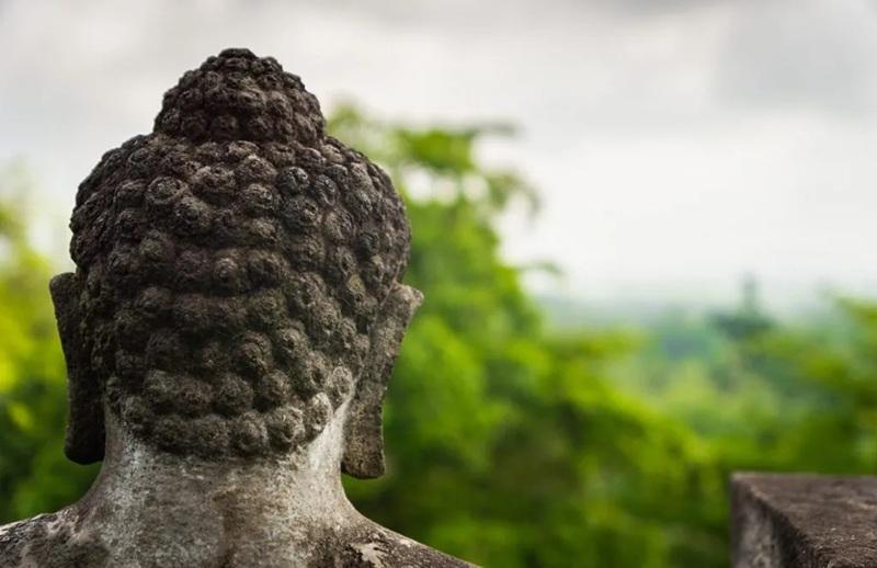 Tượng Phật tại chùa Borobudur, một ngôi chùa Phật giáo thế kỷ thứ 9 ở Indonesia | uskarp / Alamy Stock Photo Tượng Phật tại chùa Borobudur, một ngôi chùa Phật giáo thế kỷ thứ 9 ở Indonesia | uskarp / Alamy Stock Photo